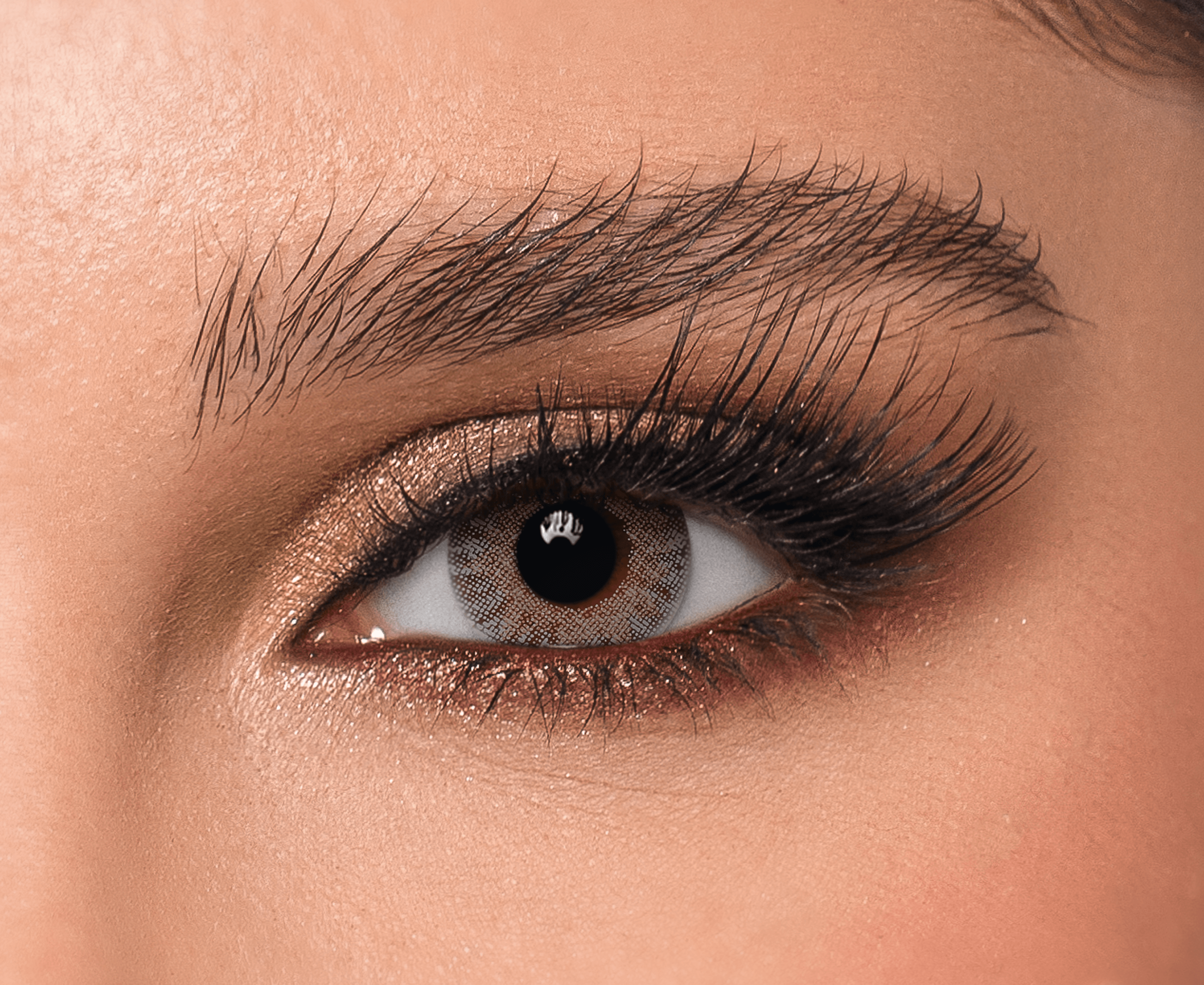 Close-up of eye wearing Alora DYE contact lens, Soft Light Gray color