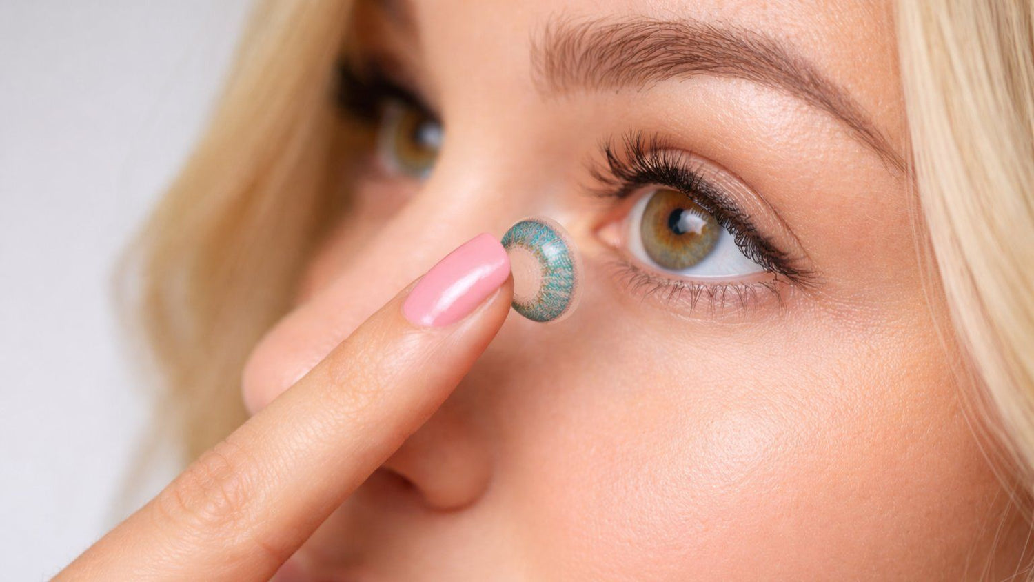 woman wearing coloured contact lens