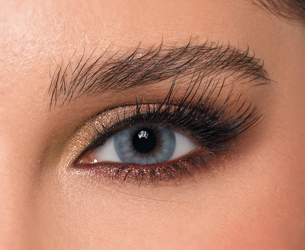 Close-up of eye wearing Stardust DYE Monthly Contact Lenses in Misty Grayish Blue color